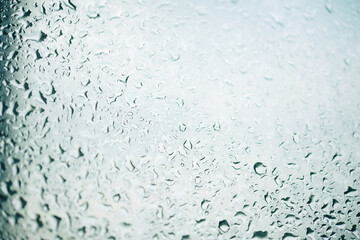 
Glass with drops, grunge background