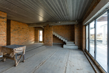 Interior construction of housing project patched without painting applied.