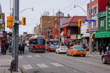 Naklejka na ściany i meble Toronto Canada - 27 March 2015 - Corner Huron Street and Dundas Street in downtown Toronto Ontario