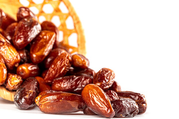 Dates fruit on white background, close up. Ramadan kareem with dates. Religious Muslim background...