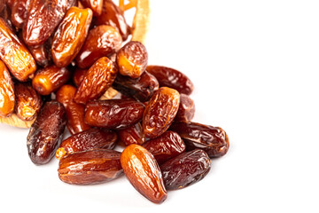 Dates fruit on white background, close up. Ramadan kareem with dates. Religious Muslim background...