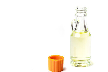 Unrefined coconut oil on a white background with wooden spoon