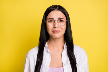 Photo of sad miserable young lady wear glasses cry bad mood isolated on shine yellow color...