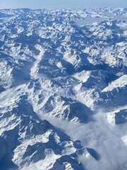 aerial view of the alps covered of snow during winter