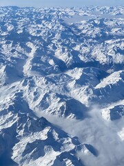 aerial view of the alps covered of snow during winter