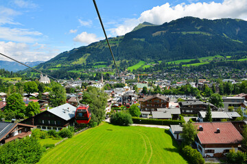 View of the Kitzbuhel town seen from cable car who lift up to Hahnenkamm ski run, Kitzbuhel, Tirol,...