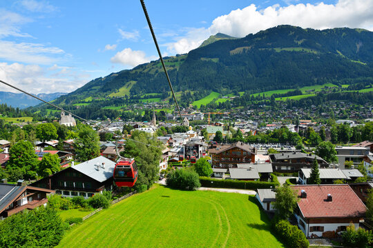 View of the Kitzbuhel town seen from cable car who lift up to Hahnenkamm ski run, Kitzbuhel, Tirol, Austria