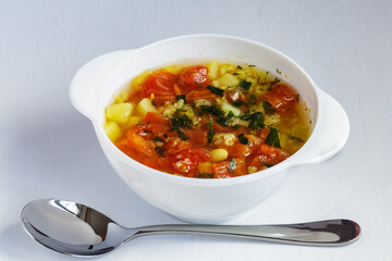 Tomato soup with beans and spices. Delicious vegetarian soup.