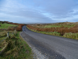 Ireland road trip, road in the countryside, travel destination.