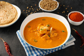 Paneer butter masala , Paneer tikka masala curry Delhi Mumbai North Indian vegetarian side dish butter paneer made using cottage cheese, Indian spices for roti, paratha, chapati