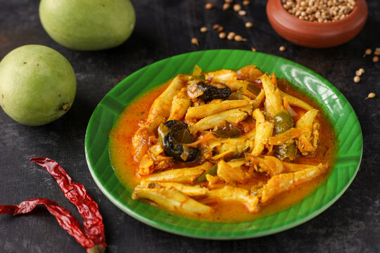 spicy hot anchovy Kerala fish curry. Indian food.  Fish curry with red chili, curry leaf, coconut milk. Asian cuisine. Delicious spicy , Bengali , Goan fish curry India Sri Lanka/