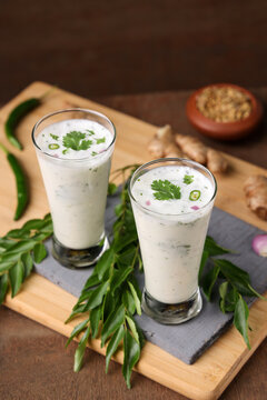 Spiced buttermilk , chaas , chaach , moru , sambharam , curd, lassi , yogurt, cool refreshing drink for hot summer in glass , Kerala, India. Flavored Indian buttermilk.
