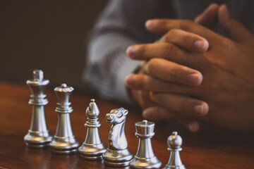 Businessman moving chess.ideas concept Plan leading strategy of successful competition.