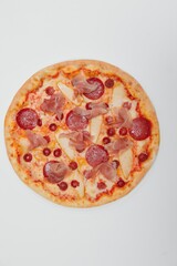 Thinly sliced pepperoni is a popular pizza topping in American-style pizzerias