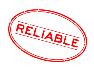 Grunge red reliable word oval rubber seal stamp on white background