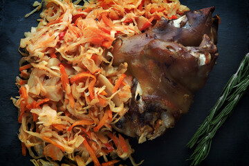 Pork knee with stewed cabbage. A traditional German or Czech dish. Aysban.