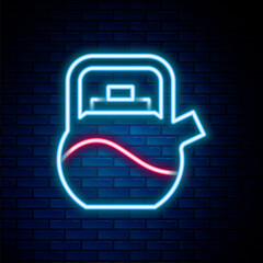 Glowing neon line Kettle with handle icon isolated on brick wall background. Teapot icon. Colorful outline concept. Vector