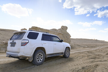 Fototapeta na wymiar Off road car in desert