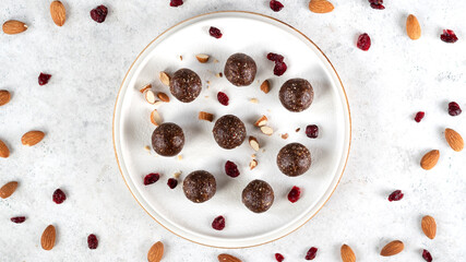 Step by step cooking Energy balls. Step 11 recipe of no bake energy balls. Homemade healthy raw vegetarian dessert is ready to eat. Healthy eating. Enjoy your meal. Flat lay.