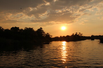 Fototapeta na wymiar beautiful sunset at the okavango river in namibia