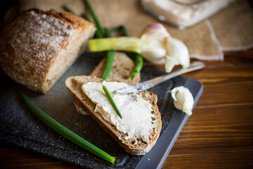 Homemade buckwheat bread with garlic cheese spread