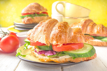 Croissant sandwich with fresh vegetables