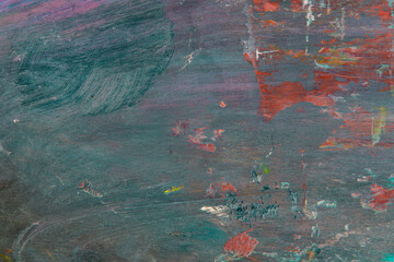 colorful creative motley background: smudged residues of oil paints on a wooden palette, short...