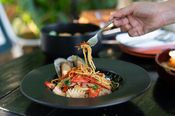 Stir Fried Spaghetti with Spicy Seafood, European and Asian fusion dishes and are popular in Thailand