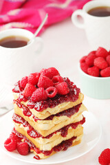 Sandwiches with peanut butter and raspberry jam