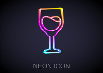 Glowing neon line Wine glass icon isolated on black background. Wineglass sign. Vector