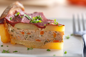 Layered moussaka with tomato sauce