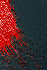 abstract creative background: red spots, strokes and splashes of colored primer when toning a black...