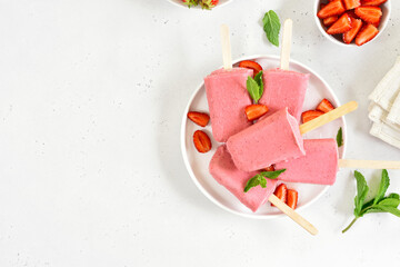 Strawberry ice cream popsicles