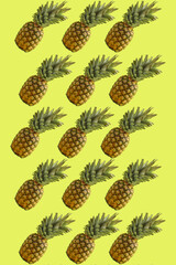 The pattern of pineapple on yellow background. Fruit concept.