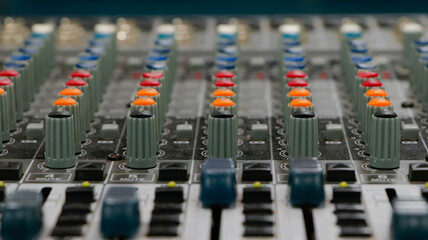 Sound mixer with continuous colored adjustment buttons and loudspeaker adjustments