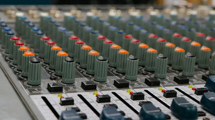 Sound mixer with continuous colored adjustment buttons and loudspeaker adjustments