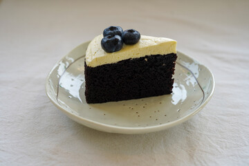 Dark beer cake in white plate
