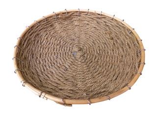 Fototapeta premium Close up of rustic raffia tray. Aerial view of natural rattan oval basket isolated on white background. Handmade bowl with natural materials, water hyacinth braiding, ethnic style. Household concept.