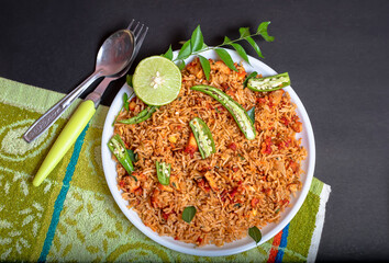 Chicken fried rice with lemon and green chillies, curry leaves