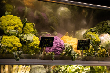 Vegetables stall in the marketplace in Barcelona, grocery store retail refrigerator