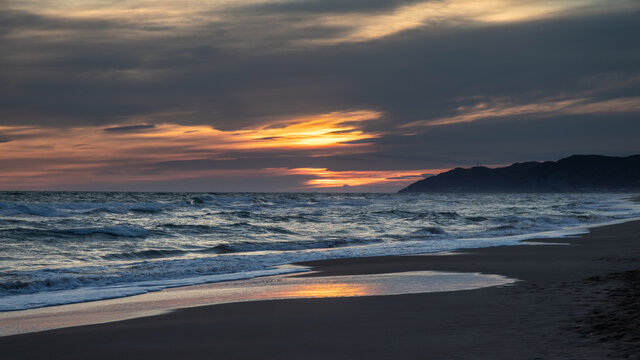 Sunset on the beach of CastelldeFels, Spain © olly_plu