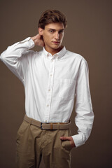 Obraz premium business man in shirt self-confidence manager beige background