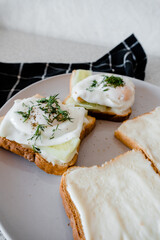 a plate of toast with fried eggs