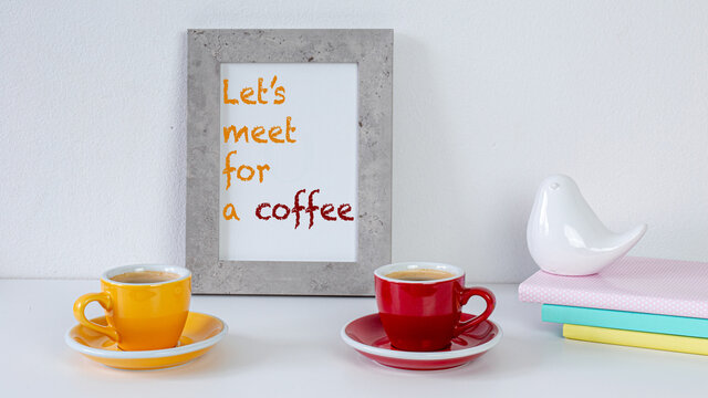 Let's meet for a coffee. Time for coffee with a friend. Isolation time. Two cups with coffee on a white table for friends. Background. Cozy minimalist place for friends over coffee. Relax Time