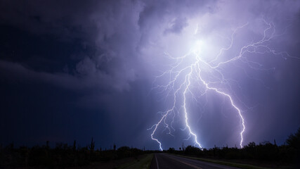 Storm and lightning bolt strike in the night sky