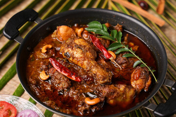 Chettinad Chicken Curry , Sri Lankan Chicken curry pepper chicken gravy recipe Kerala India. Dhaba style chicken with hot spicy gravy Indian non vegetarian curry side dish of rice chapati roti paratha