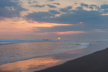 Beautiful sunset sky on the beach in Matapalo, Costa Rica. Central America. Sky background on sunset. Tropical sea.