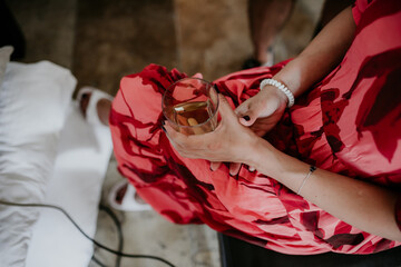 Obraz premium woman drinking whiskey glass hands