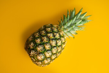 ripe pineapple isolated on white background. Bright pineapple in minimal style. Fresh pineapples on blue background. Tropical fruits. Vegetarianism. Summer fruits.