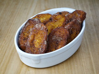 Traditional homemade and Delicious Spanish Torrijas in a ceramic platter